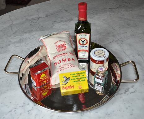 Spanish paella pan with contents of paella kit